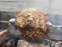 Spit-roasted beef dredged in oil and breadcrumbs to protect the meat from the fire